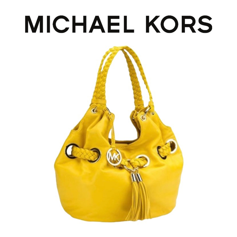 MICHAEL KORS Braided Tassel Bucket Bag in Canary Yellow Leather. 
EUC.
